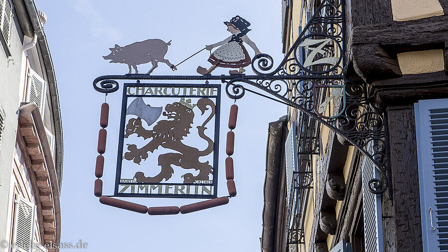 Von Hansi gestaltetes Schild einer Metzgerei in Colmar