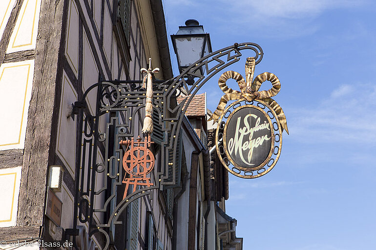 Ladenschild des Hansi in Colmar